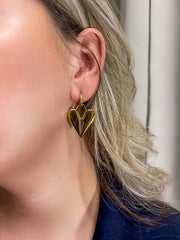 Elegant Golden Hearts sieraad voor een klassieke look.