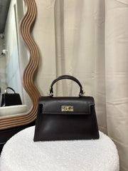 Stylish Harley Chocolate Bag placed elegantly on a wooden table